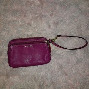 Small Coach hot pink wristlet
